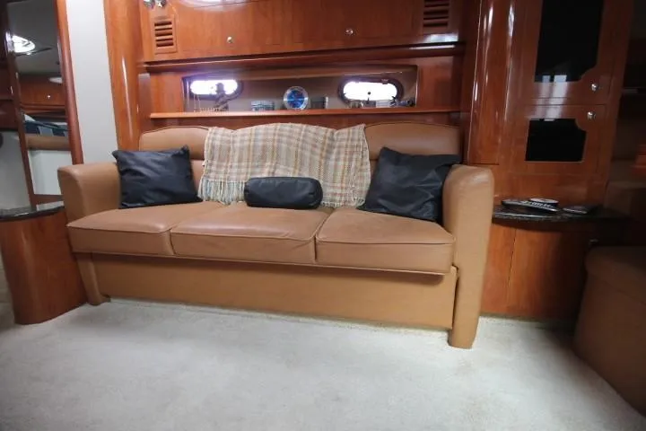 Slide: The Image of Luxurious interior of 2006 Four Winns 378 Vista yacht with leather sofa and cushions. - 34