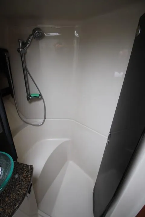 Slide: The Image of 2006 Four Winns 378 Vista boat shower with handheld showerhead and sleek design. - 38