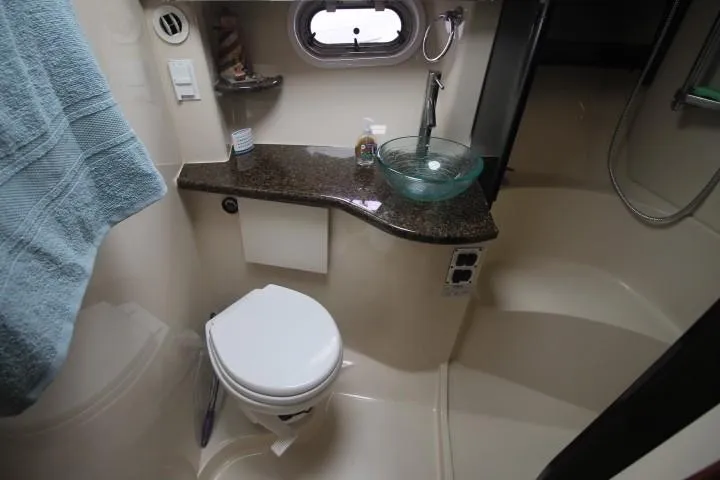 Slide: The Image of 2006 Four Winns 378 Vista yacht bathroom with modern fixtures and compact design. - 39