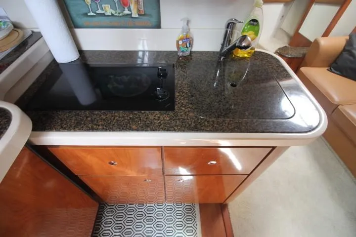 Slide: The Image of 2006 Four Winns 378 Vista yacht kitchen with granite countertop and modern appliances. - 43