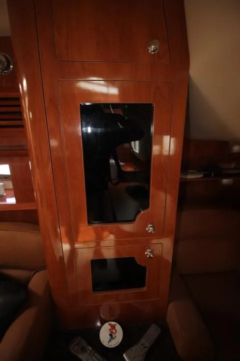 Slide: The Image of Interior of 2006 Four Winns 378 Vista yacht with wooden cabinetry and seating. - 45