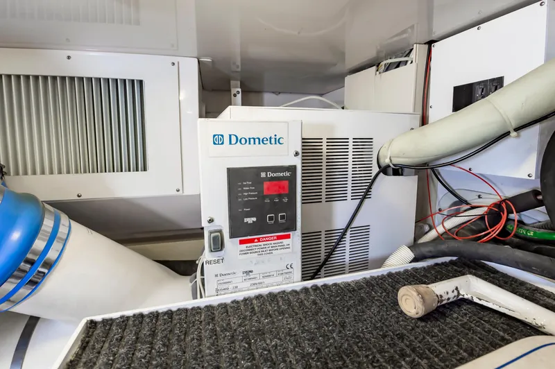 Slide: The Image of Dometic control panel in 2003 Viking 61 Convertible yacht engine room. - 33