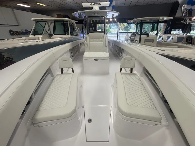 Slide: The Image of 2025 Jupiter 380LS boat interior with white seating and modern design. - 14