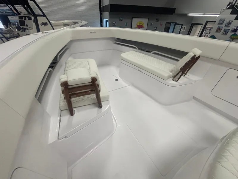 Slide: The Image of 2025 Jupiter 380LS boat interior with white seating and modern design. - 16