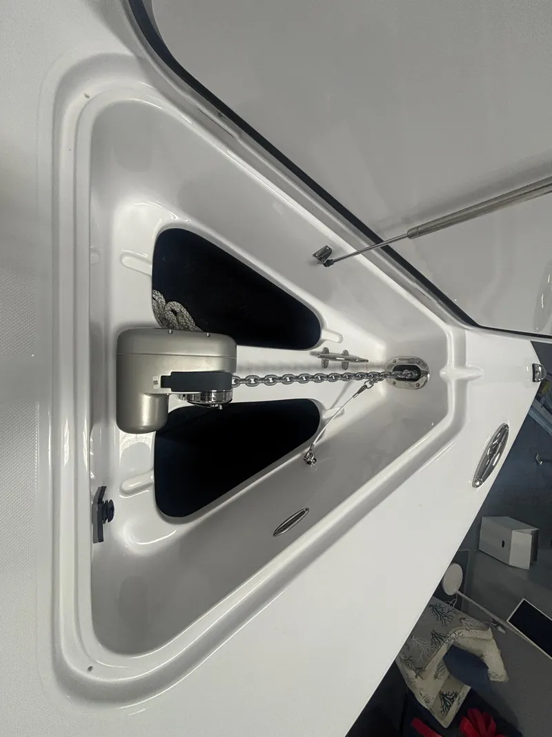 Slide: The Image of Anchor compartment of 2025 Jupiter 380LS boat, featuring modern design and chain mechanism. - 17