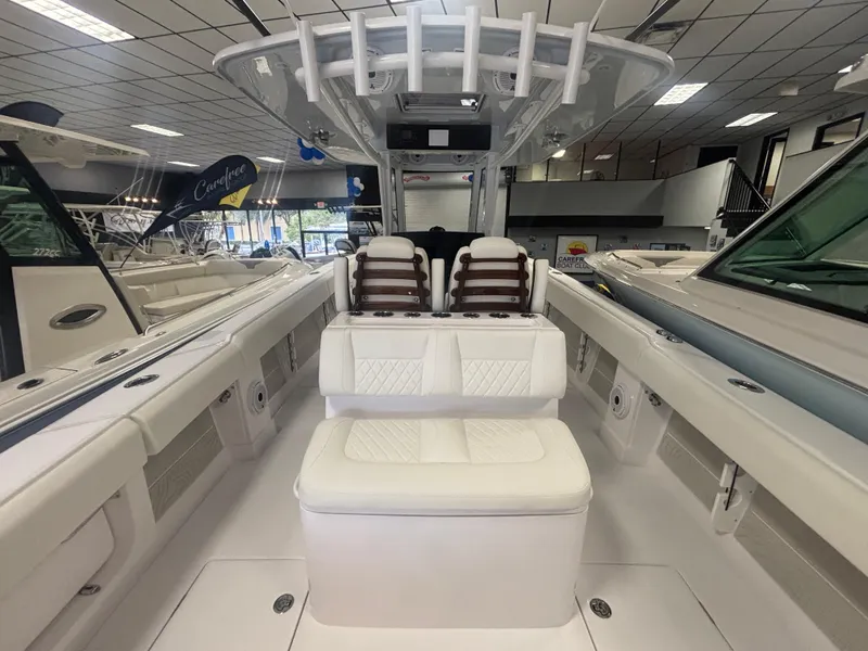 Slide: The Image of 2025 Jupiter 380LS boat interior with white seating and modern design. - 22