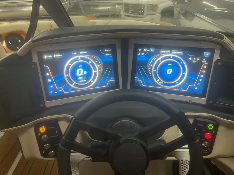 Slide: The Image of 2023 Centurion Ri230 dashboard with dual digital displays and steering wheel. - 4