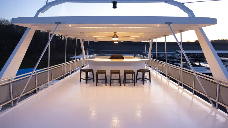 Slide: The Image of Luxurious Thoroughbred 99 x 20 yacht deck with bar stools, 2002 model. - 10