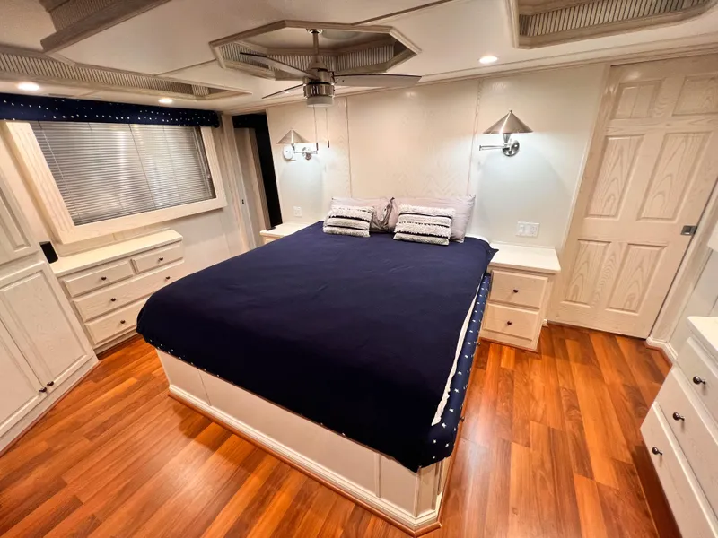 Slide: The Image of Luxurious bedroom in 2002 Thoroughbred 99 x 20, featuring hardwood floors and elegant decor. - 27
