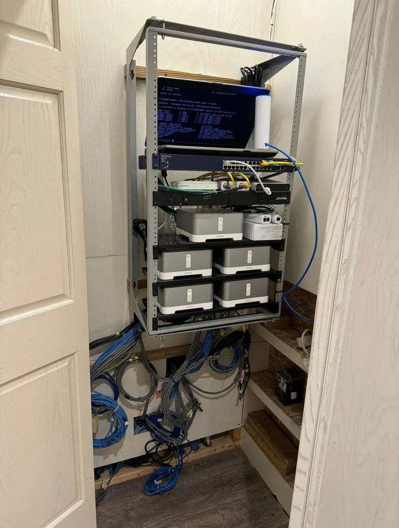 Slide: The Image of Server rack with cables and equipment in a small room, Thoroughbred 99 x 20, 2002 model. - 31