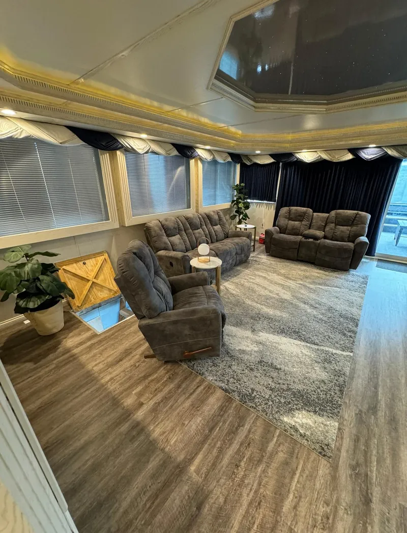 Slide: The Image of Luxurious living room in a 2002 Thoroughbred 99 x 20, featuring plush seating and elegant decor. - 44