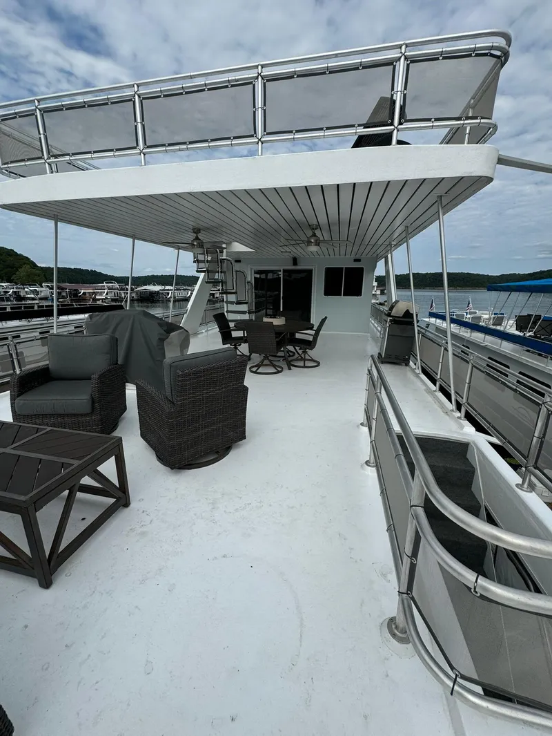 Slide: The Image of Spacious deck of 2002 Thoroughbred 99 x 20 yacht with outdoor seating. - 9