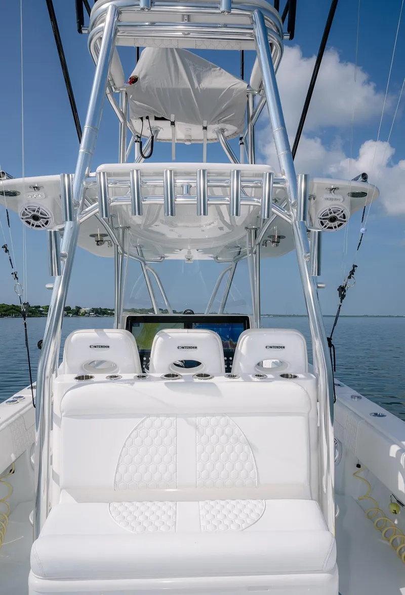 Slide: The Image of 2022 Contender 39 ST boat interior with seating and fishing equipment. - 5