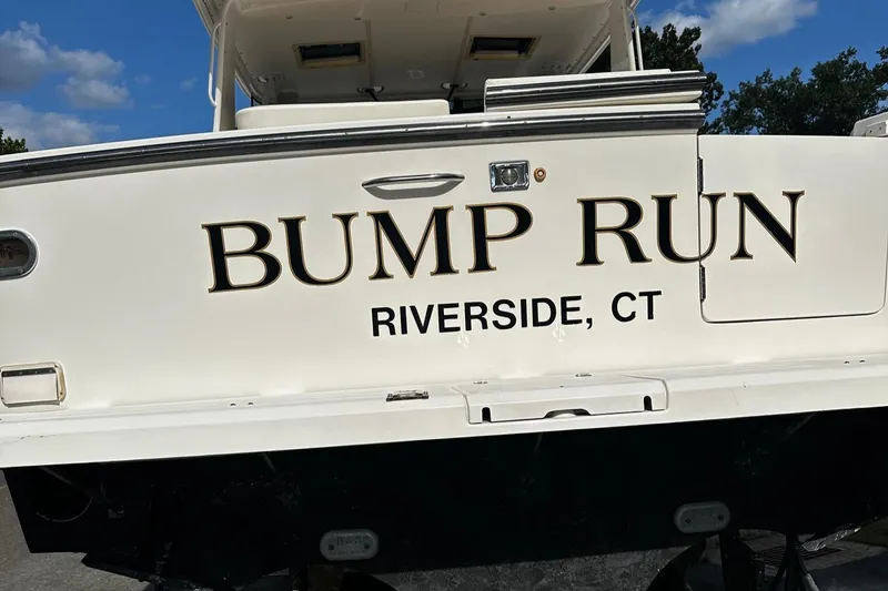 Slide: The Image of 1999 Tiara Yachts 43 Open, named "Bump Run," docked in Riverside, CT. - 32