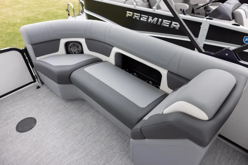 Slide: The Image of 2025 Premier 230 Solaris RF boat interior with gray seating and modern design. - 12