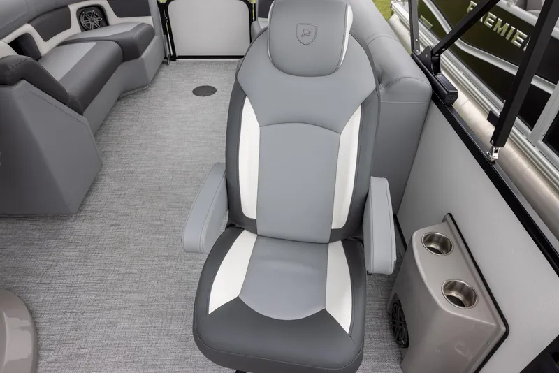 Slide: The Image of 2025 Premier 230 Solaris RF interior with gray and white seating, cup holders, and modern design. - 8