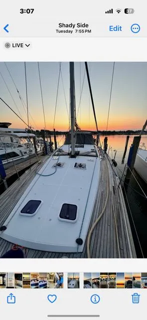 Slide: The Image of 2016 Jeanneau 58 sailboat docked at sunset, Shady Side marina. - 22