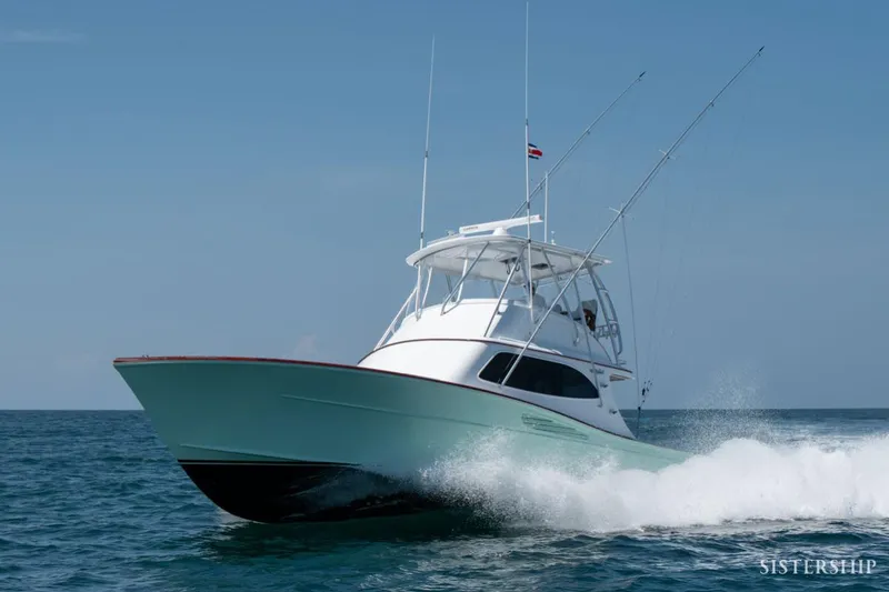 Slide: The Image of 2025 Maverick Yachts Costa Rica 45 Sportfish cruising on open water. - 2