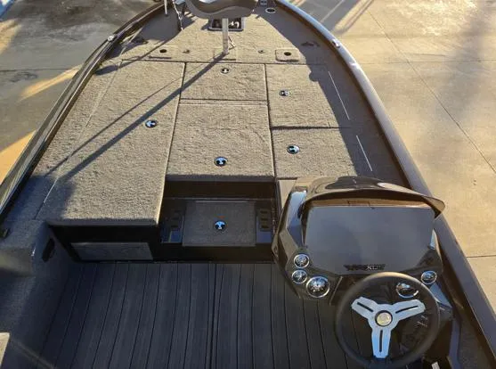Slide: The Image of 2025 Vexus AVX1980C boat interior with steering wheel and storage compartments. - 3