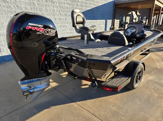 Slide: The Image of 2025 Vexus AVX1980C boat with Mercury Pro XS engine, parked outdoors. - 5