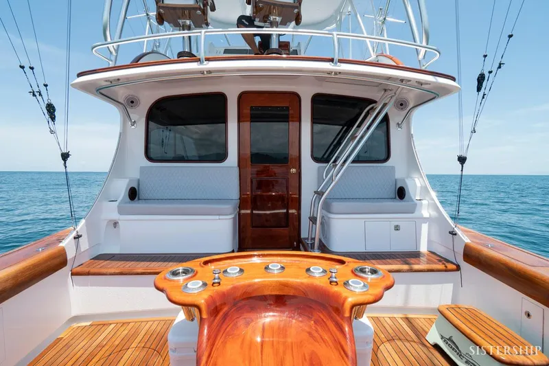 Slide: The Image of 2025 Maverick Yachts Costa Rica 45 Sportfish, elegant deck with polished wood finish. - 10
