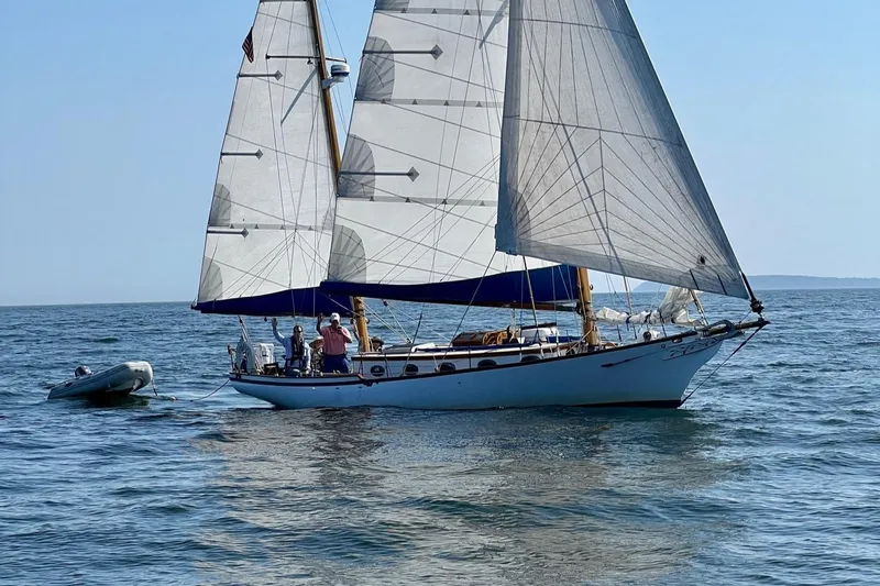 The Image of 1985 Herreshoff Nereia Molly's Cove 38' sailboat with FRP hull on open water. - 0