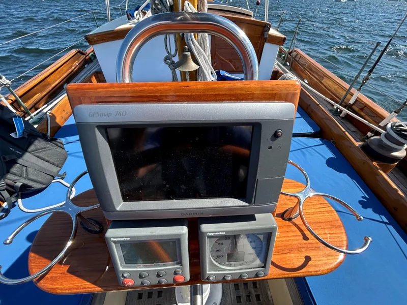 Slide: The Image of 1985 Herreshoff Nereia Molly's Cove 38' sailboat cockpit with navigation instruments. - 23