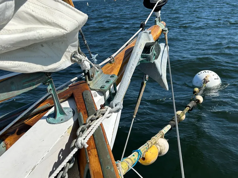 Slide: The Image of Bow of 1985 Herreshoff Nereia Molly's Cove 38' with anchor and mooring buoy. - 30