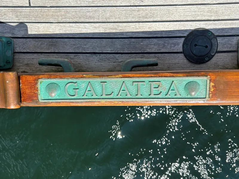 Slide: The Image of 1985 Herreshoff Nereia Molly's Cove 38' boat with "Galatea" nameplate on deck. - 38