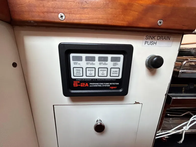 Slide: The Image of Control panel on 1985 Herreshoff Nereia Molly's Cove 38' with FRP hull, featuring gas detector. - 49