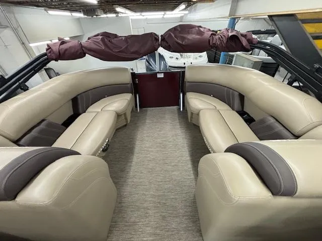 Slide: The Image of 2022 Sylvan Mirage X X3 boat interior with beige leather seating. - 12