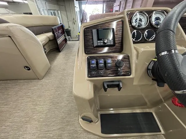 Slide: The Image of 2022 Sylvan Mirage X X3 boat interior with modern dashboard and steering wheel. - 5