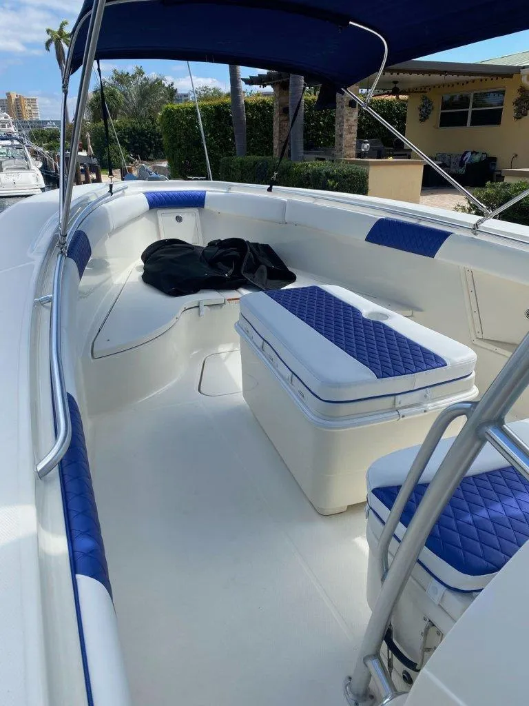 Slide: The Image of 2004 Hydra-Sports Vector 3300 CC boat with blue seating and canopy. - 11