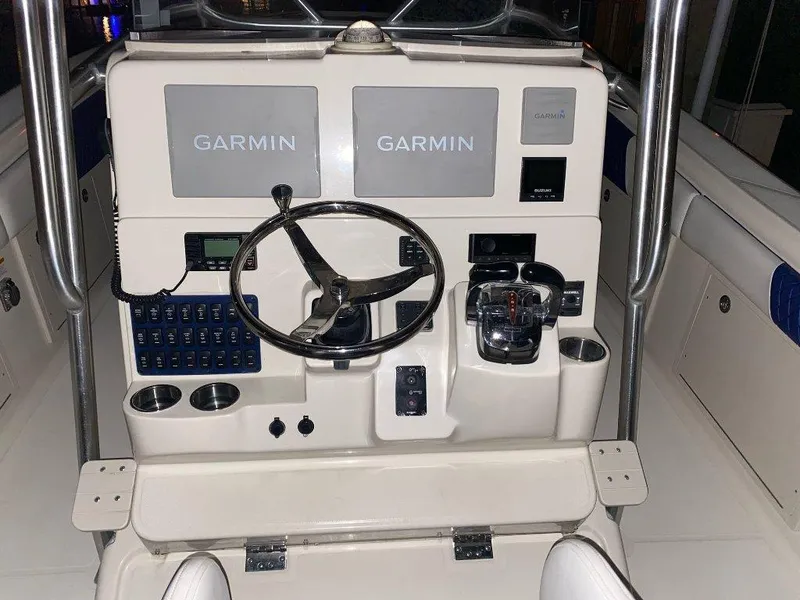 Slide: The Image of 2004 Hydra-Sports Vector 3300 CC boat dashboard with Garmin navigation system. - 14