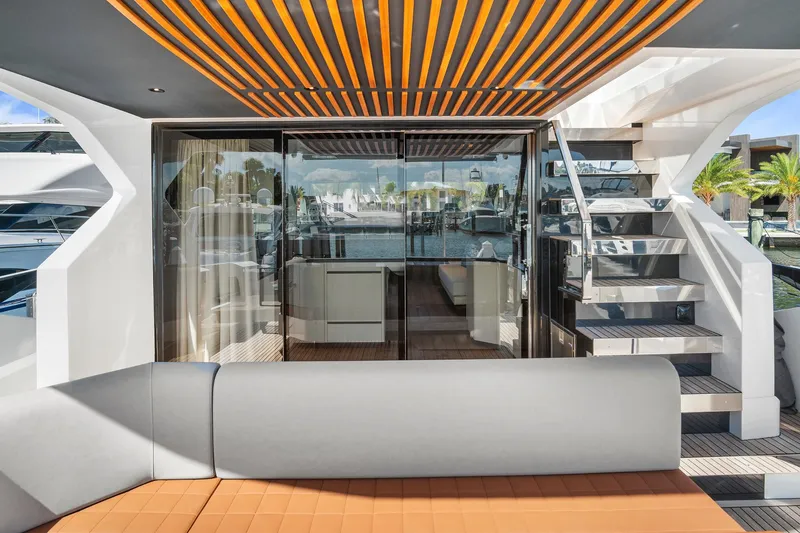 Slide: The Image of 2023 Astondoa AS5 yacht interior with modern design and sleek staircase. - 10