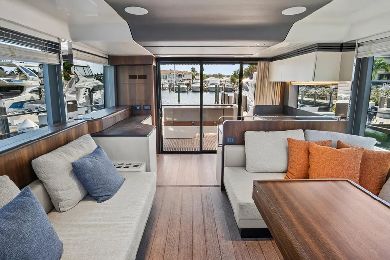 Slide: The Image of Luxurious 2023 Astondoa AS5 yacht interior with modern design and waterfront view. - 23