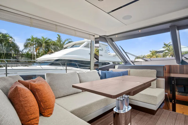 Slide: The Image of Luxurious 2023 Astondoa AS5 yacht interior with elegant seating and table. - 25