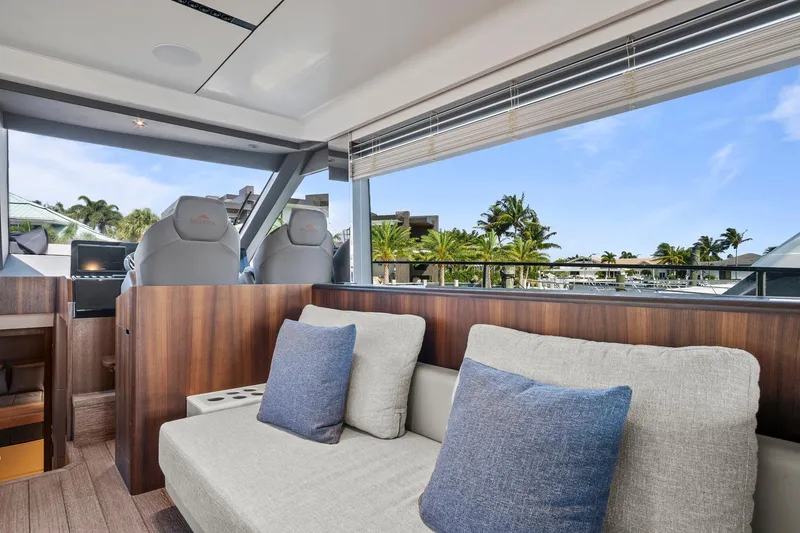 Slide: The Image of Luxurious interior of 2023 Astondoa AS5 yacht with modern seating and scenic view. - 26