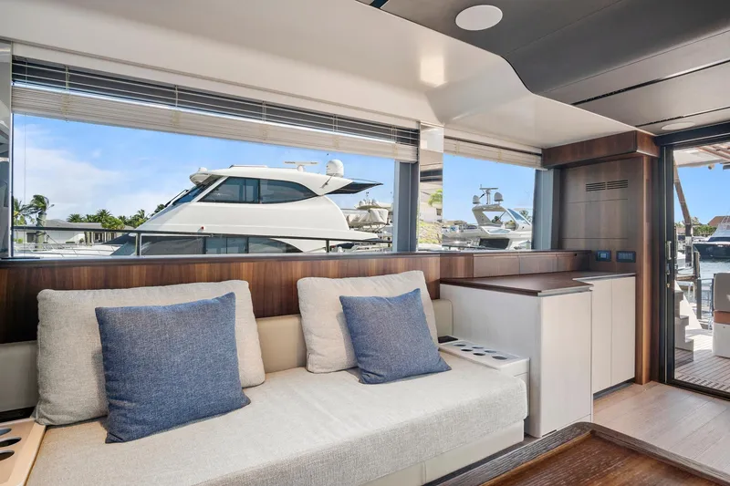 Slide: The Image of Luxurious interior of 2023 Astondoa AS5 yacht with modern seating and large windows. - 27