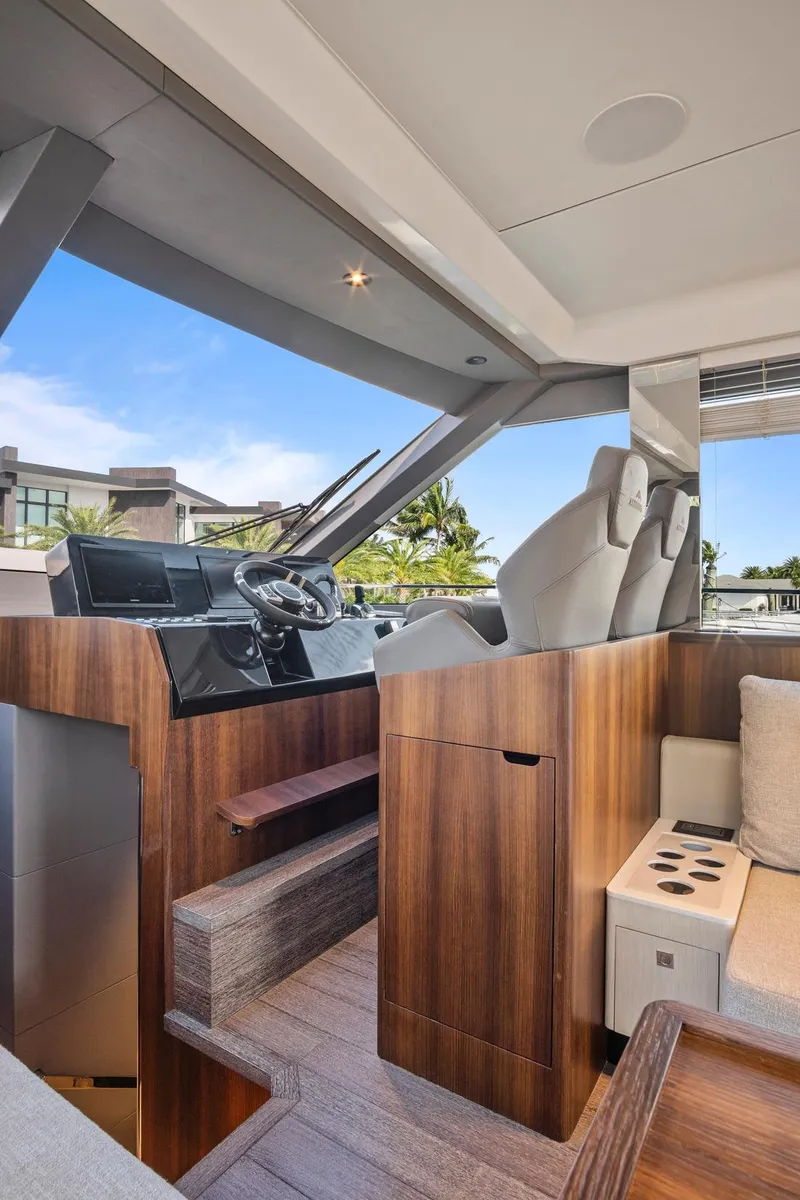Slide: The Image of Interior of 2023 Astondoa AS5 yacht with modern helm and luxurious seating. - 28