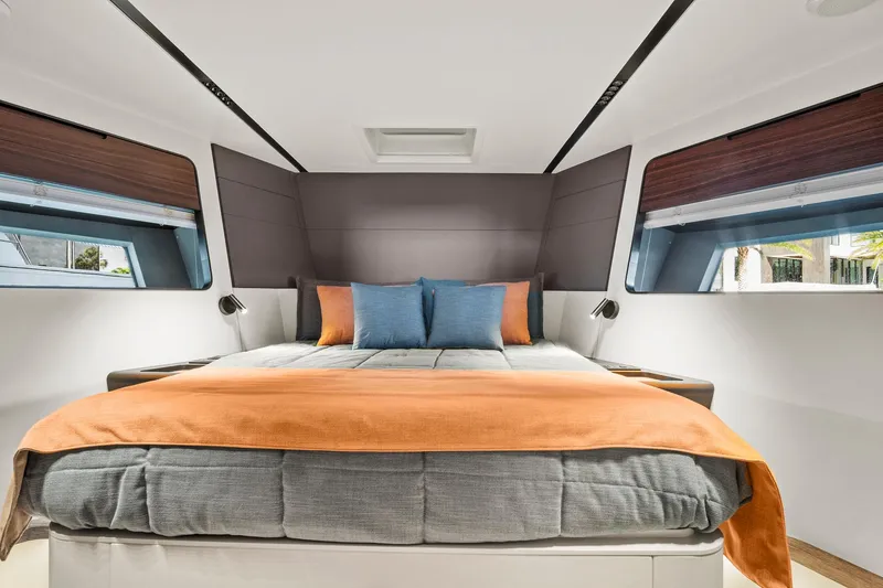 Slide: The Image of Luxurious 2023 Astondoa AS5 yacht bedroom with modern design and cozy bedding. - 40
