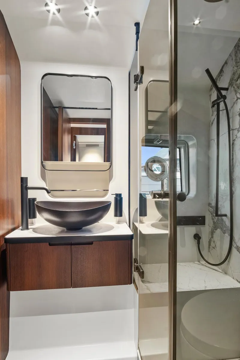 Slide: The Image of Luxurious bathroom in 2023 Astondoa AS5 yacht with modern fixtures and elegant design. - 42