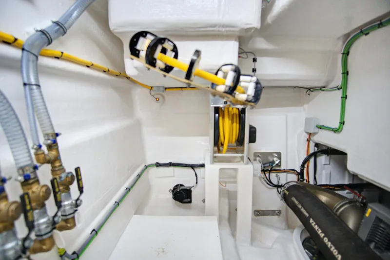 Slide: The Image of Engine room of 2023 Astondoa AS5 yacht, showcasing cables and machinery. - 47