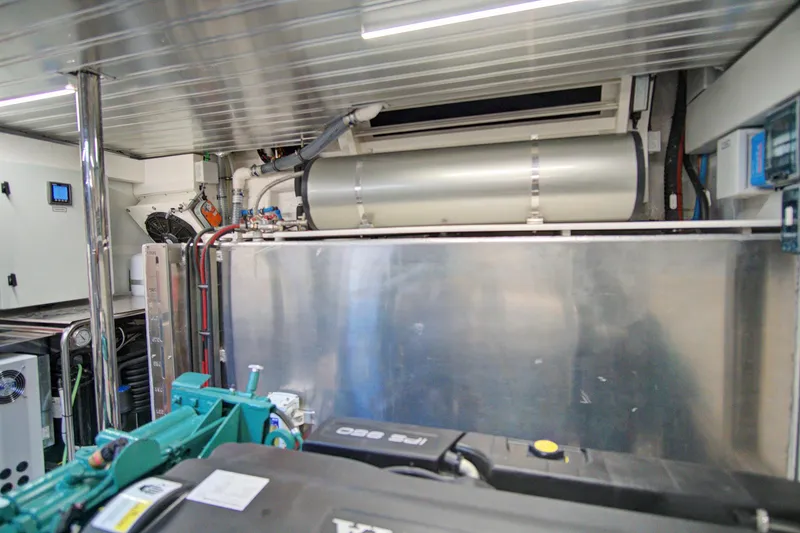 Slide: The Image of Engine room of 2023 Astondoa AS5 yacht, showcasing modern equipment and machinery. - 49