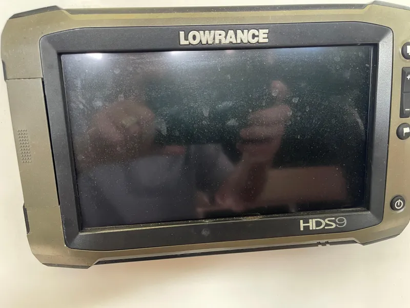 Slide: The Image of Lowrance HDS9 fishfinder on 2007 Pro-Line 25 Sport boat. - 11