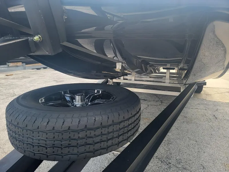 Slide: The Image of Undercarriage view of 2025 SCB S22 with spare tire on trailer. - 17