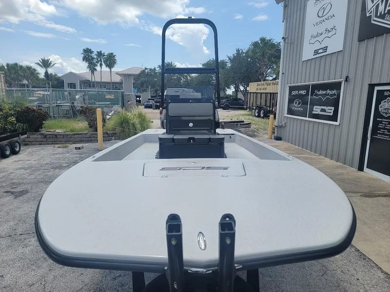 Slide: The Image of 2025 SCB S22 boat in a marina, showcasing sleek design and modern features. - 19