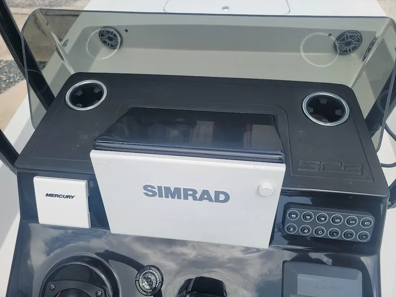 Slide: The Image of Boat dashboard with Simrad navigation system, SCB S22 model, 2025. - 23