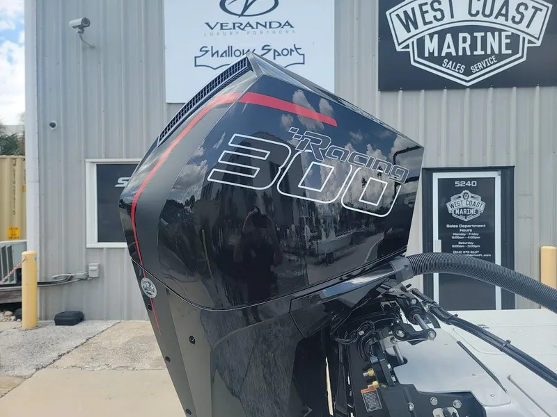 Slide: The Image of SCB S22 2025 model with Racing 300 outboard motor at West Coast Marine. - 5