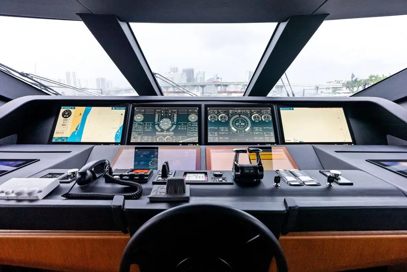 Slide: The Image of Custom Line 106' yacht helm with advanced navigation systems, 2023 model. - 14